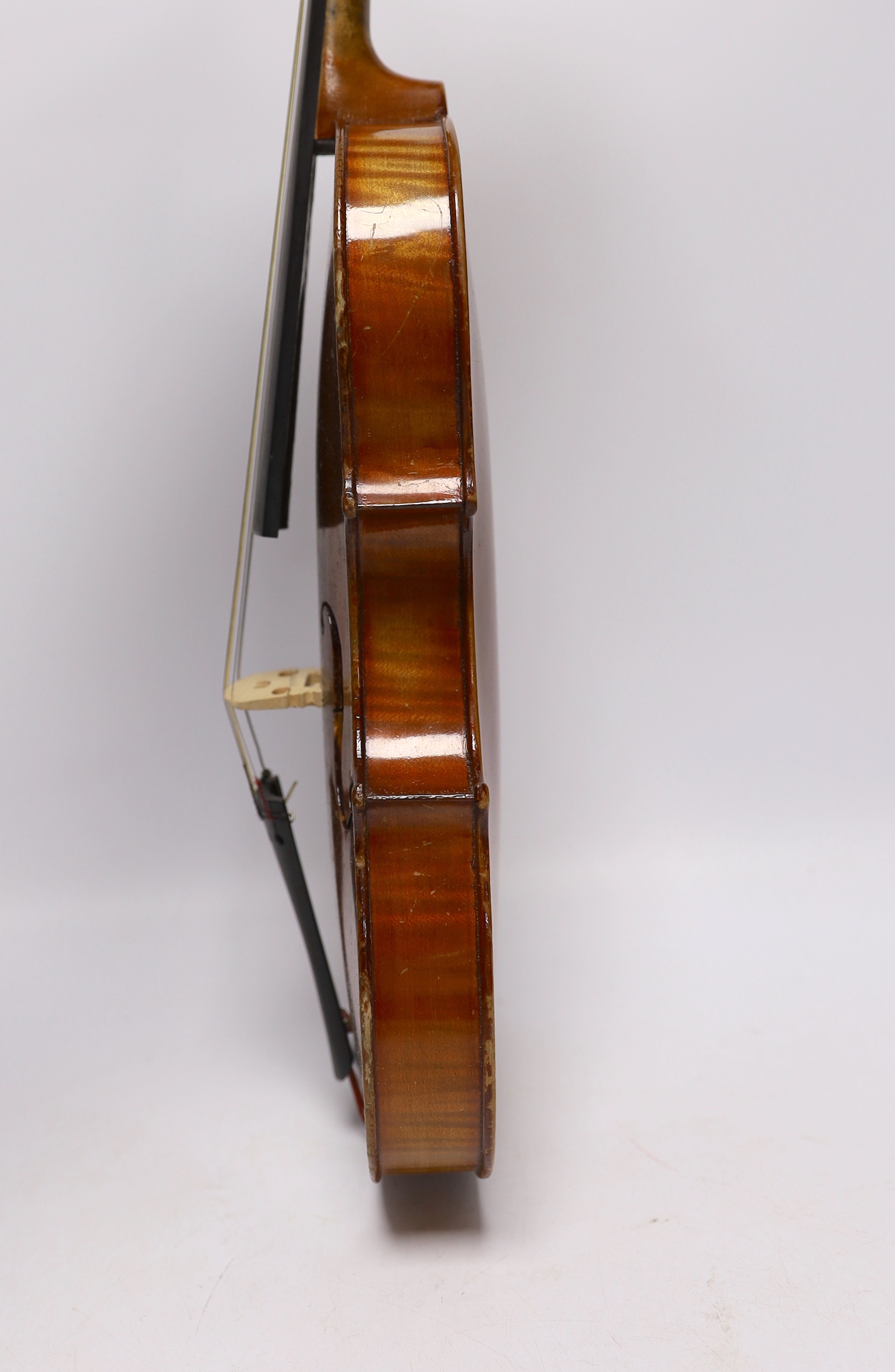 A cased 3/4 sized student violin marked Dresden, with reproduction Stradivarius label